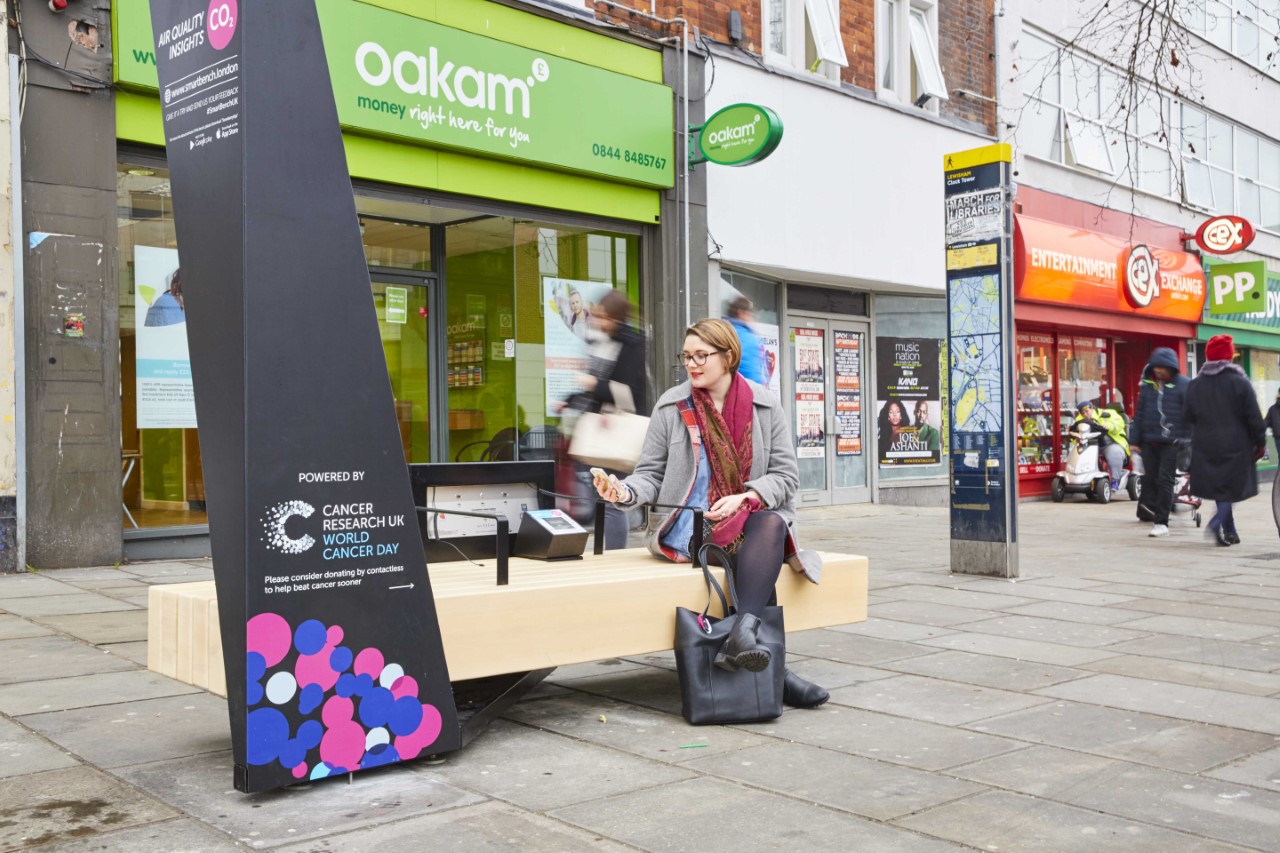 cancer-research-smart-benches-offer-solar-power-charging-free-wi-fi