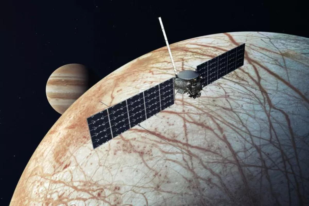 Illustration of Europa Clipper vehicle flying over Jupiter's moon Europa. Image credit NASA/JPL-Caltech