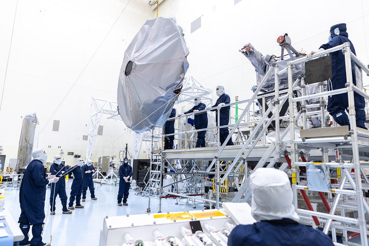 Technicians prepare to install Europa Clipper's 3-metre wide antenna on spacecraft in June 2024. Image credit: NASA